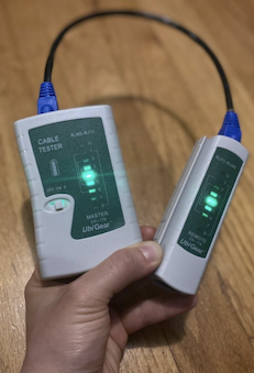 Testing with cable tester, green light showing